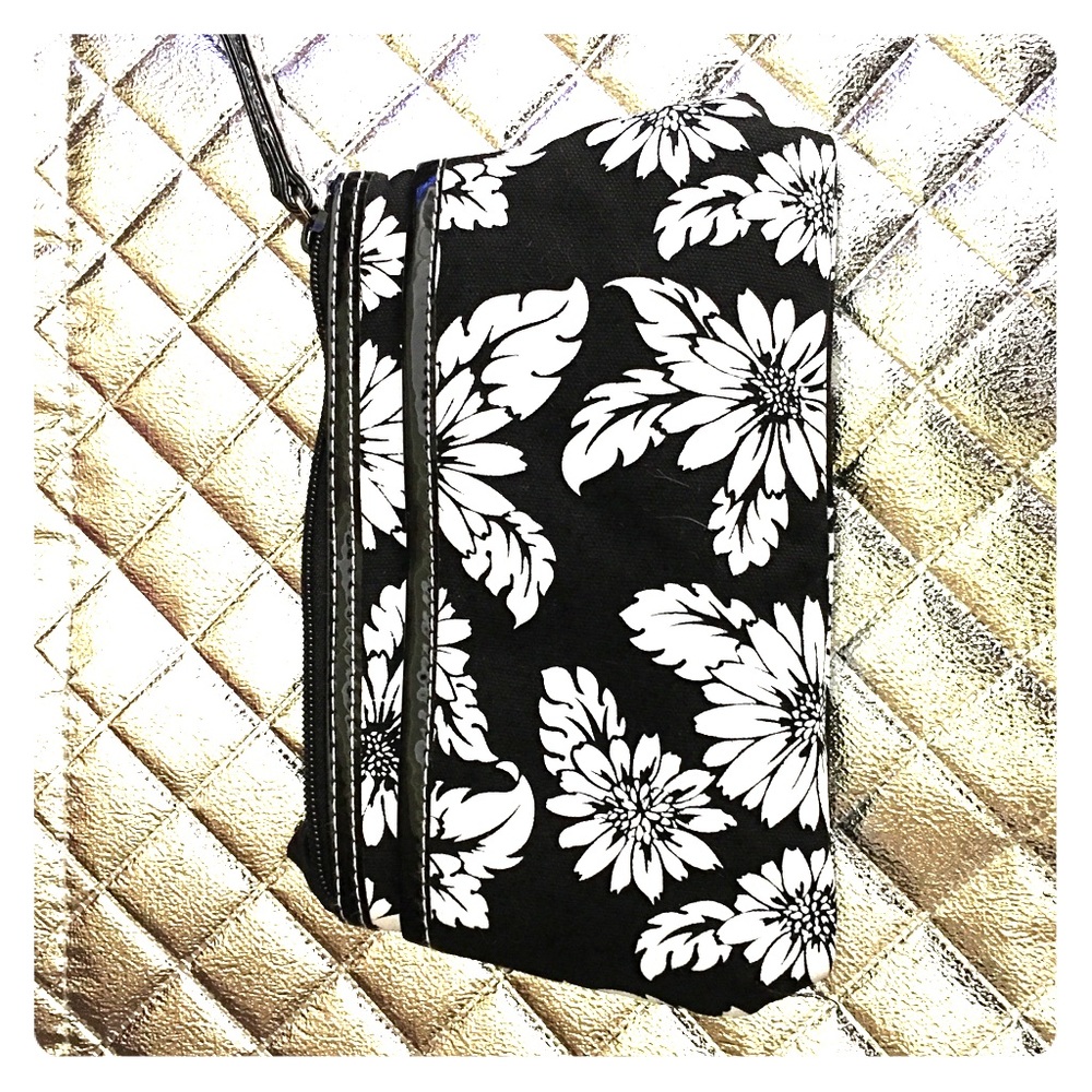 Black/white floral wristlet.